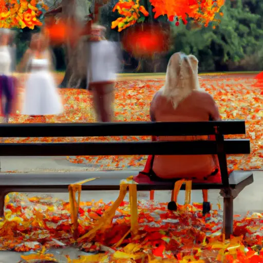 An image of a young widow sitting on a bench in a park, surrounded by vibrant autumn leaves