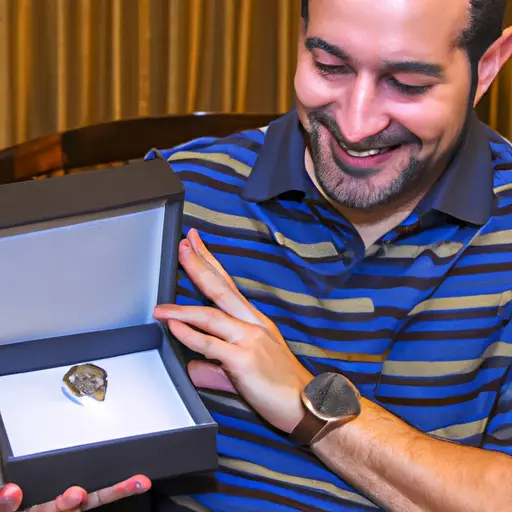 An image showcasing a husband's joyous expression as he unwraps a beautifully wrapped gift box, revealing a sleek custom engraved watch on his wrist