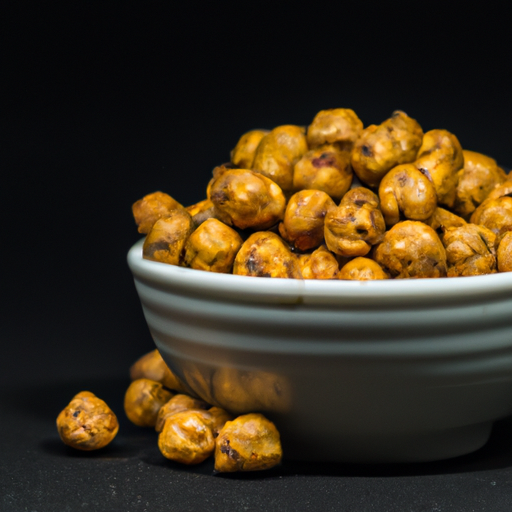 An image featuring a bowl of golden roasted chickpeas, dusted with aromatic spices
