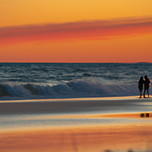 E sunset beach scene, with two silhouetted figures walking towards each other along the shore
